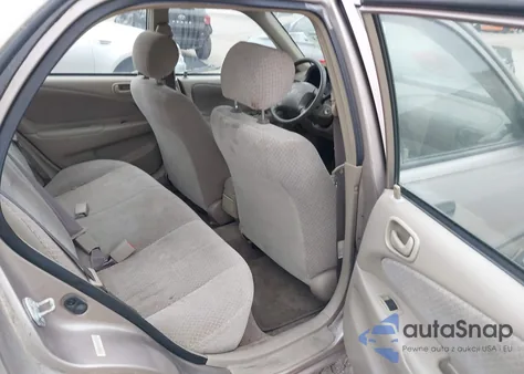 1999 Toyota Corolla Ce z USA, uszkodzony, nr VIN 2T1BR12E2XC142458